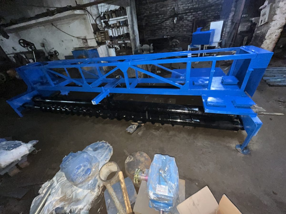RG RoadCrafter fixed form concrete paver assembly, painted and assembled